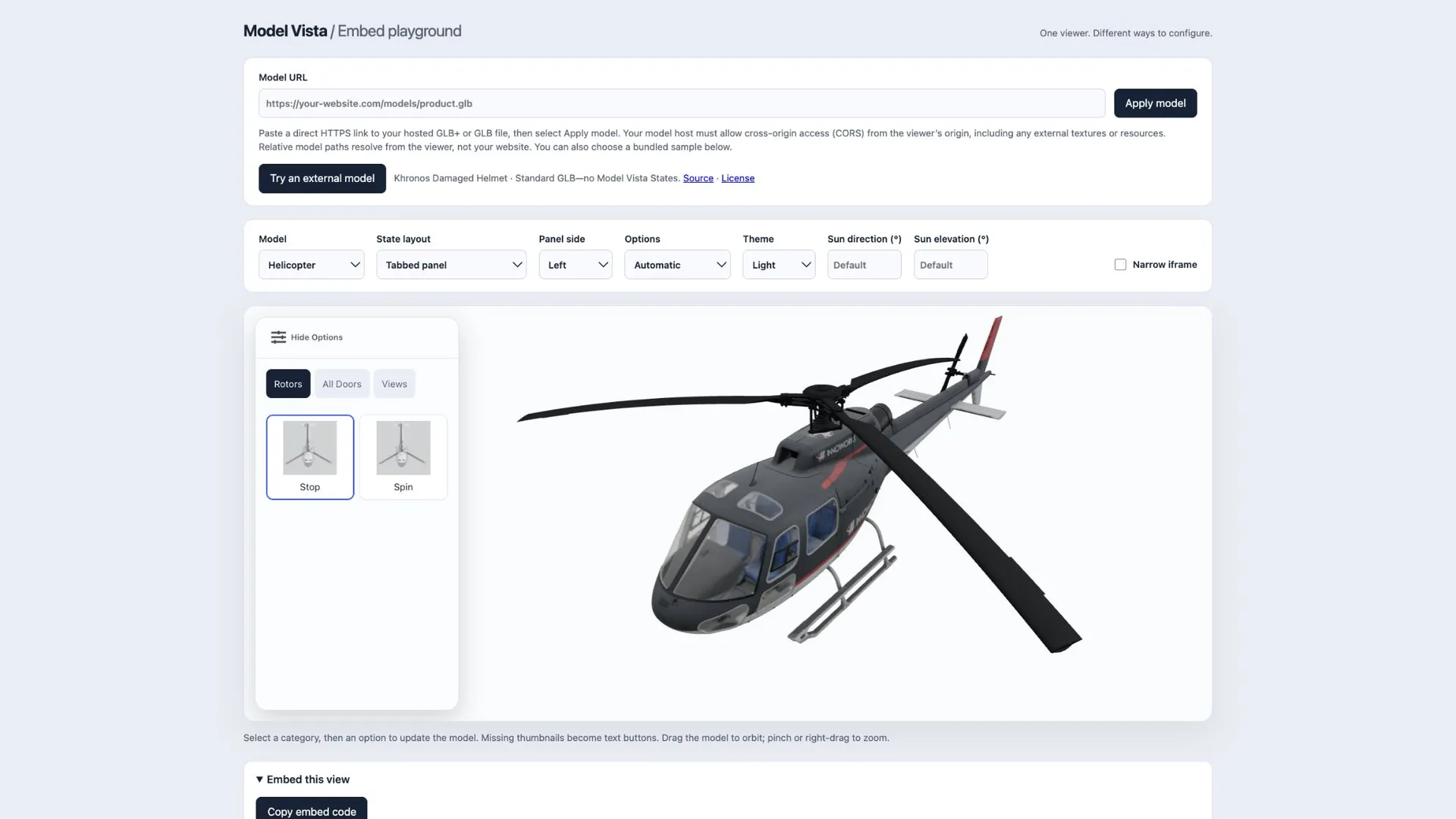 Embed playground with the model URL field, presentation controls, and Helicopter state panel